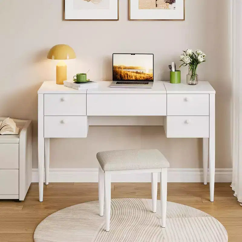 Une coiffeuse avec lumières et tabouret