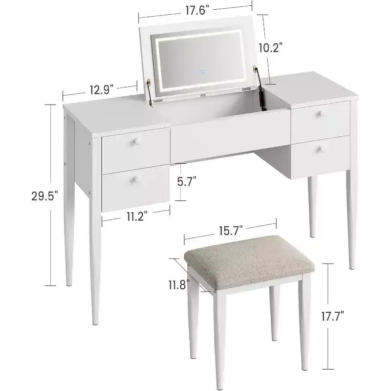 Une coiffeuse avec lumières et tabouret