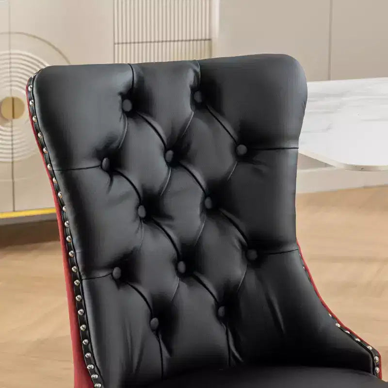 Deux chaises de salle à manger capitonnées bicolores