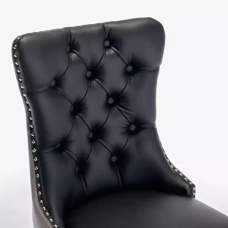 Deux chaises de salle à manger capitonnées bicolores